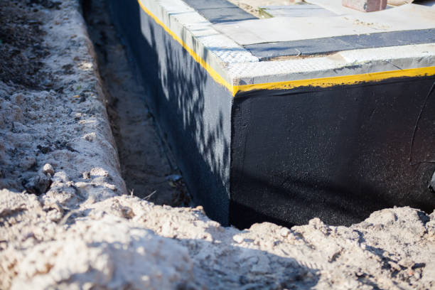 Professional Waterproofing technician working in Rose Hill, NC